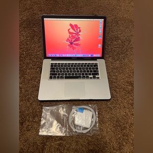 15-inch Apple MacBook Pro laptop computer with Expensive Software